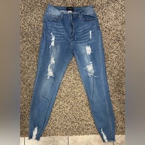 Women's Distressed Blue Jeans